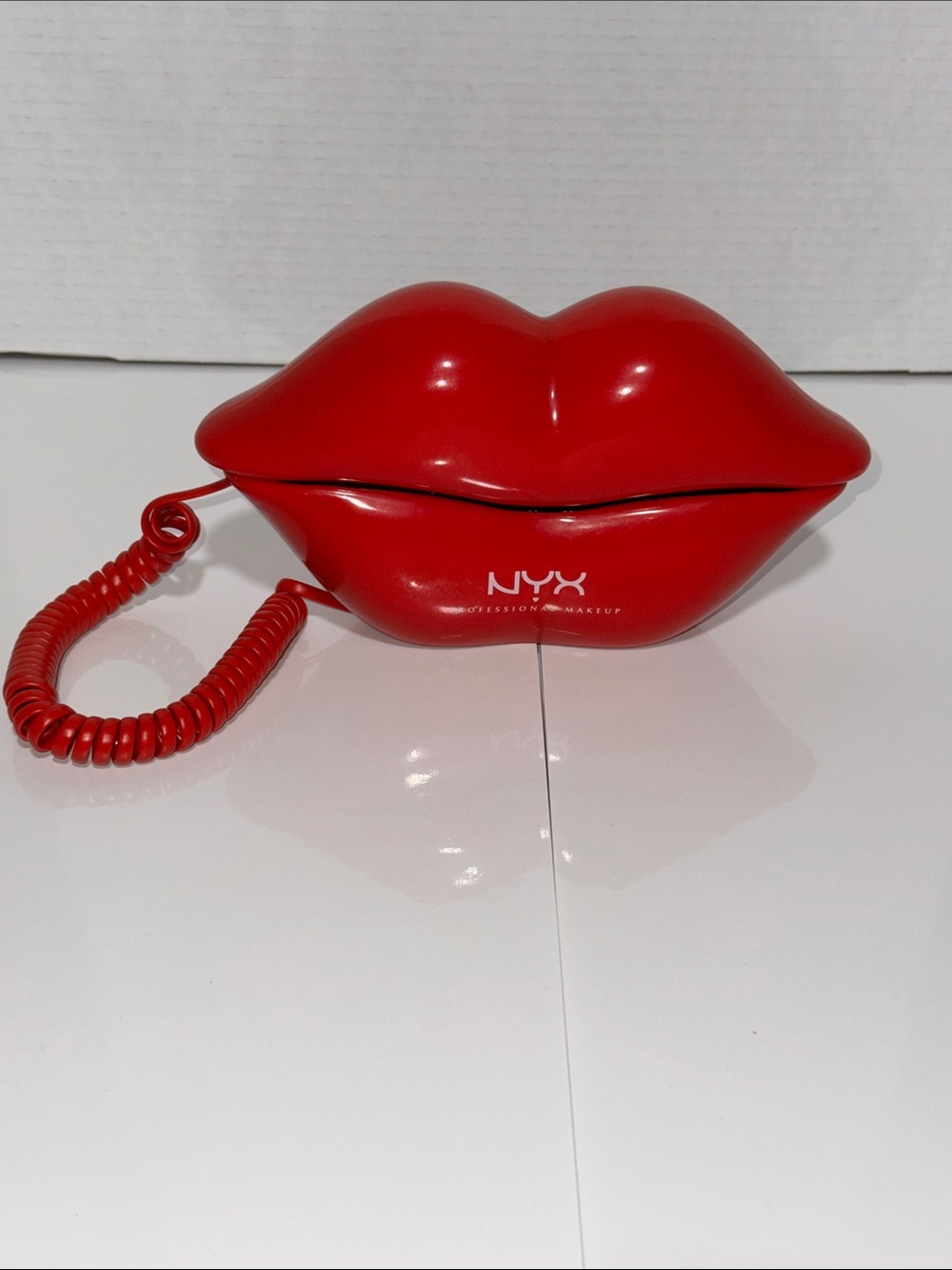 NYX Red Lip-Shaped Makeup Compact with Coiled Cord